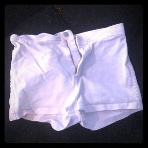 Pair of White booty shorts with zipper and button